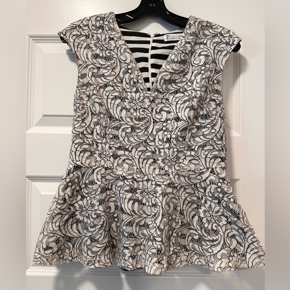 Black and white lace over stripe peplum top size medium